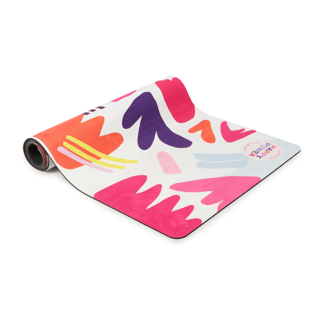 Eco friendly exercise and yoga mat with vegan suede top and natural rubber base featuring bold pink, orange, blue and yellow design on a white background. This mat can be used for workouts, yoga, pilates, stretching, meditation and more.