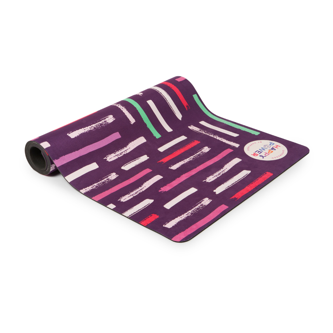 Eco friendly exercise and yoga mat with vegan suede top and natural rubber base featuring Dark purple mat with scattered coloured stripes. This mat can be used for workouts, yoga, pilates, stretching, meditation and more.